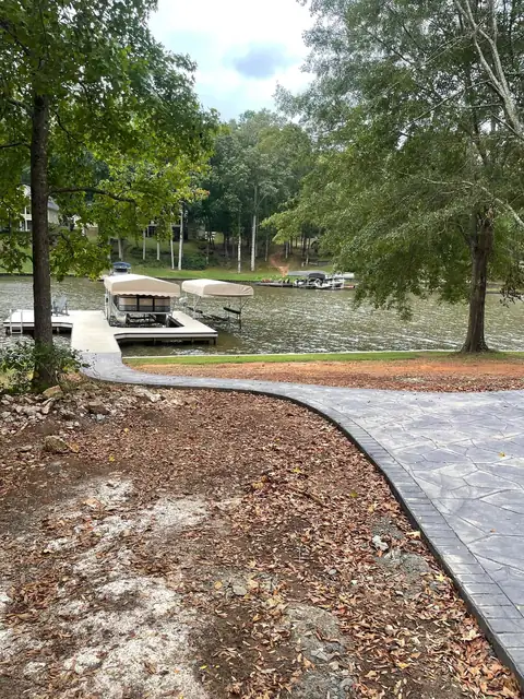 Walkway running from the patio toward the dock