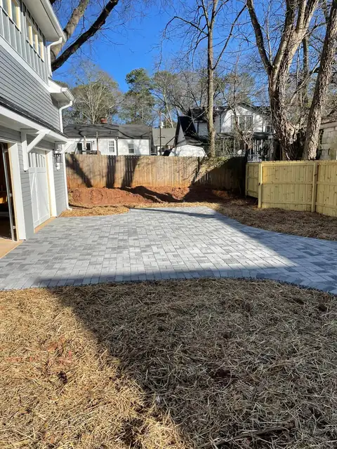 Permeable driveway running beside the house